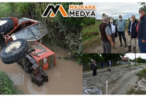 Selde devrilen traktördeki 2 kişi kurtarıldı