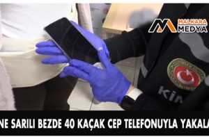 Beline sarılı bezde 40 kaçak cep telefonuyla yakalandı